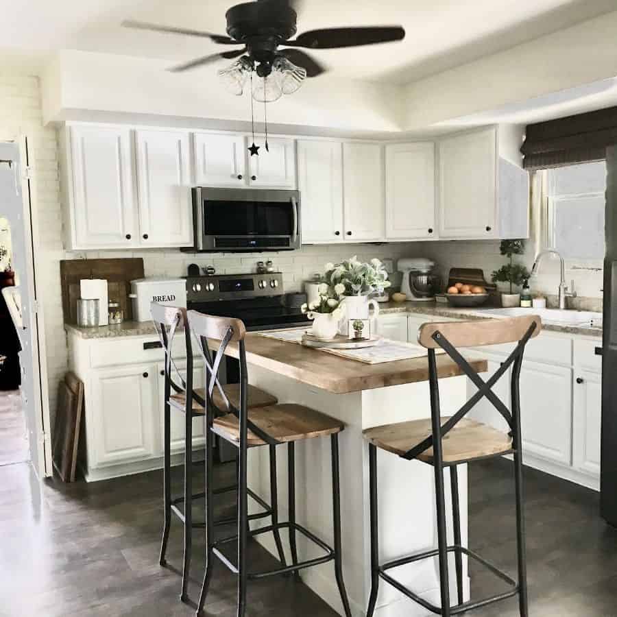 white cabinet kitchen wood countertop country kitchen 