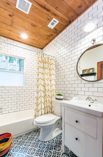 white wall tile pattern blue and white floor tile bathroom 