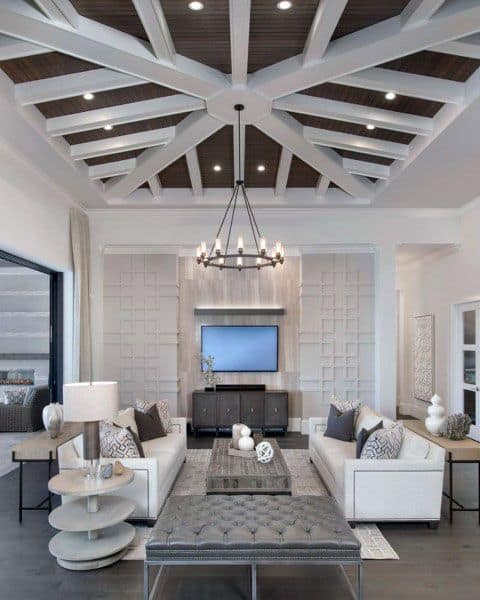 white themed living room sofas ottoman chandelier