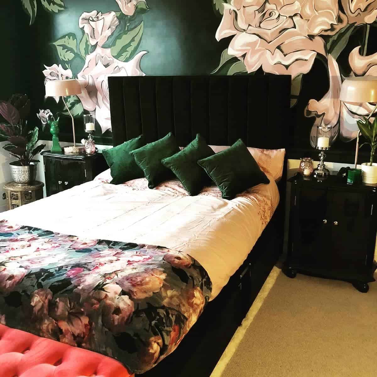 luxury bedroom black headrest green pillows floral wallpaper 