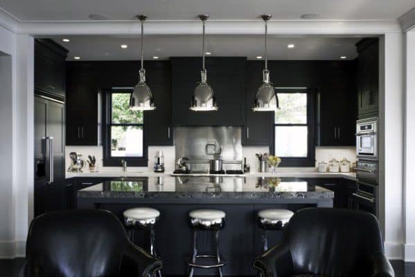 modern black kitchen with large island breakfast bar silver ceiling pendant lights 