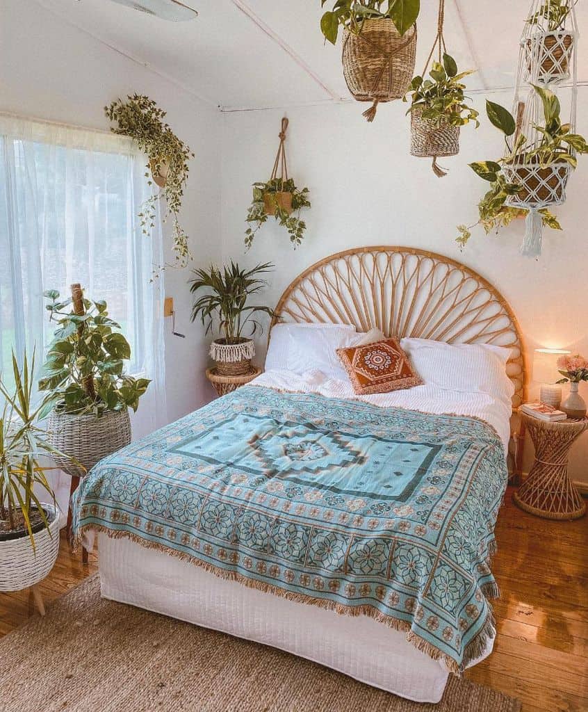 jungle inspired boho bedroom hanging potted plants