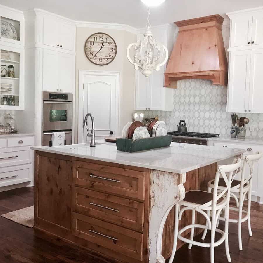 country kitchen brown oven hood tile splashback white marble top wood island 