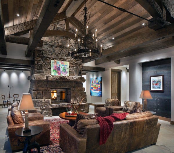 rustic cabin style living room stone fireplace 