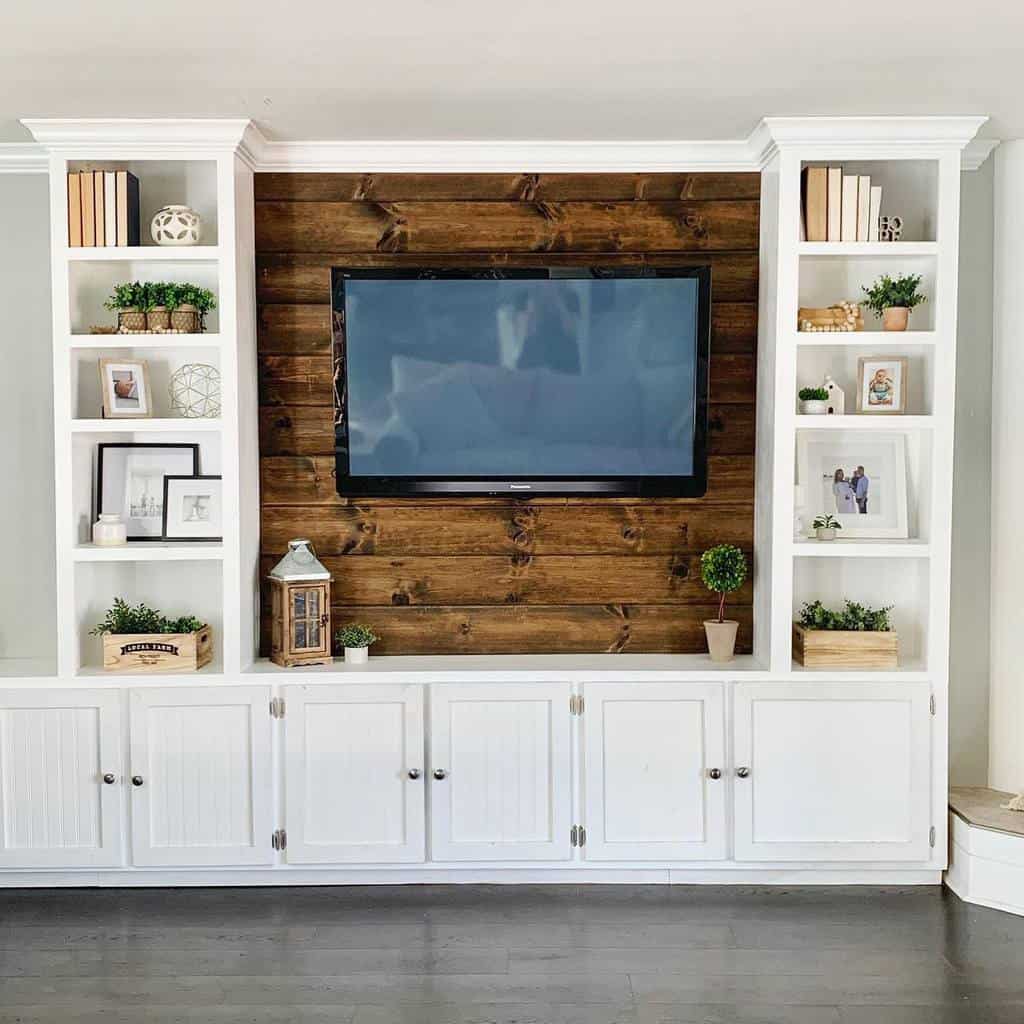 large white living room cabinet with wall mounted tv