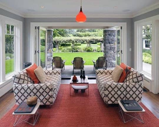 lounge chairs sunroom design with red rug
