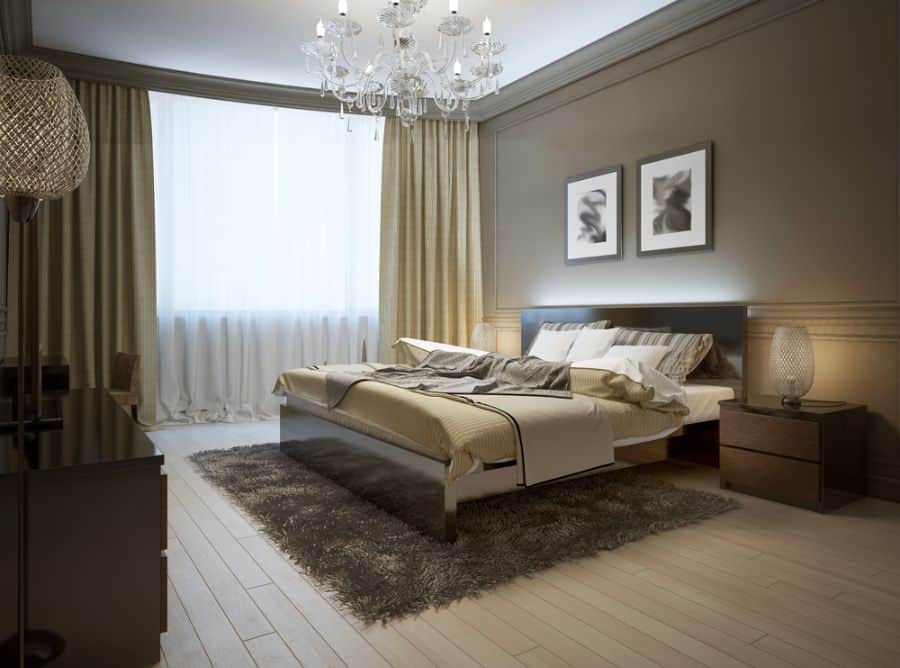 large luxury bedroom floorboards rug chandelier
