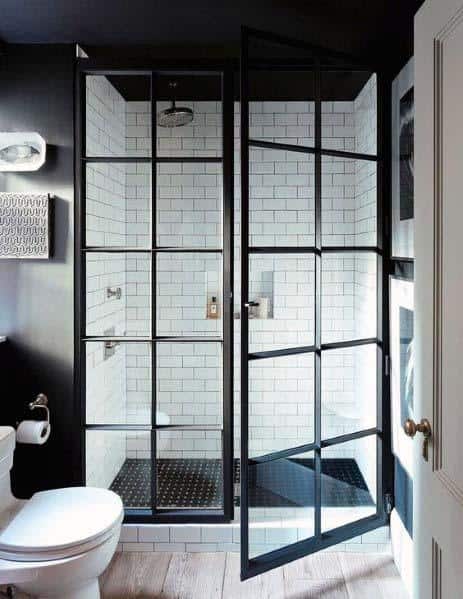 modern industrial small master bathroom  with glass doors 
