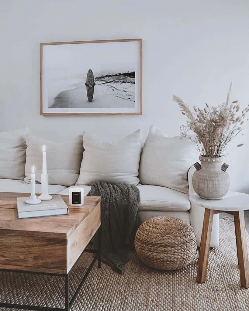 minimalist boho living room white sofa wood table wicker footrest 