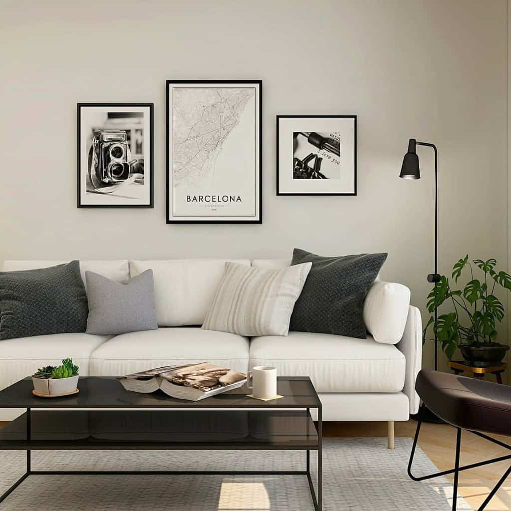 simple white living room white sofa black coffee table lamp framed wall art