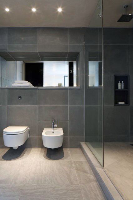 contemporary bathroom grey tiles freestanding toilet 