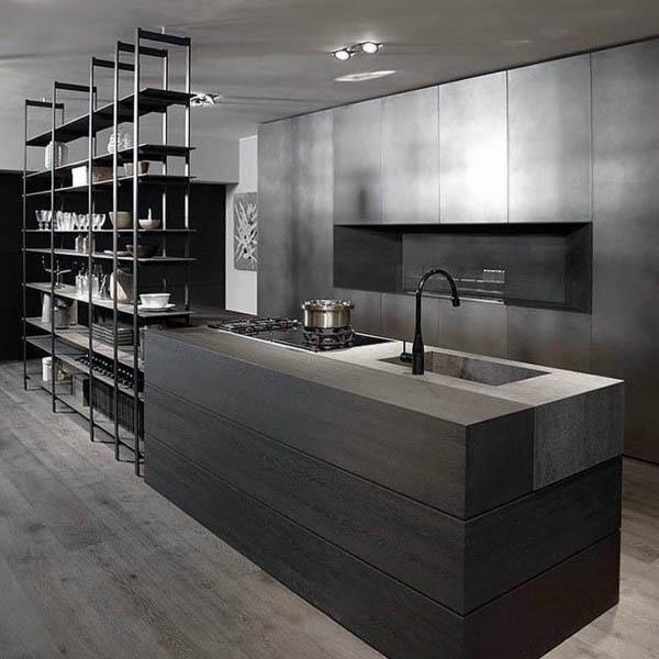 modern industrial kitchen with floor to ceiling black shelving and gray island 