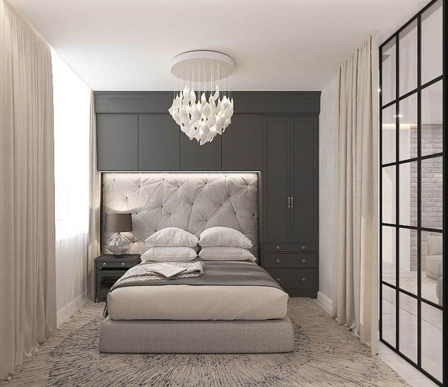 modern small bedroom with gray bed and cabinets 