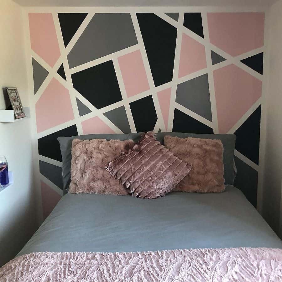 small bedroom pink gray black feature wall