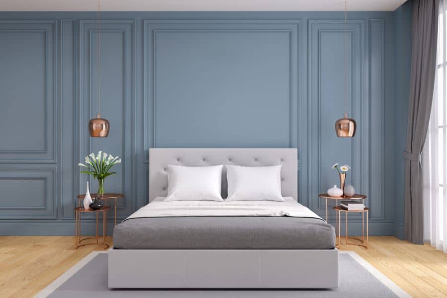 blue bedroom gray bed bronze bedside tables and lights