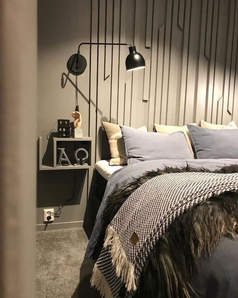 modern bedroom gray walls black lamp
