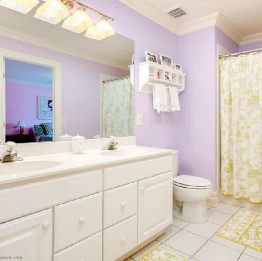 purple wall bathroom large white vanity 
