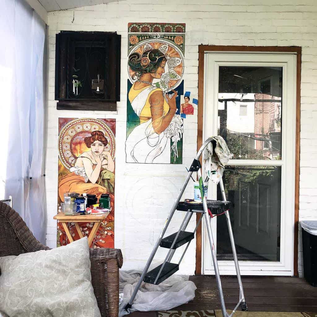 indian inspired women wall murals outside porch 