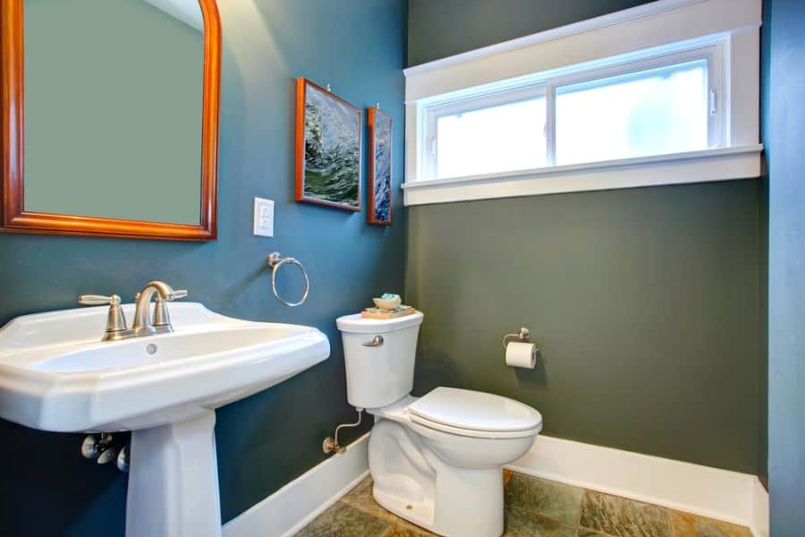 blue feature wall in small powder room