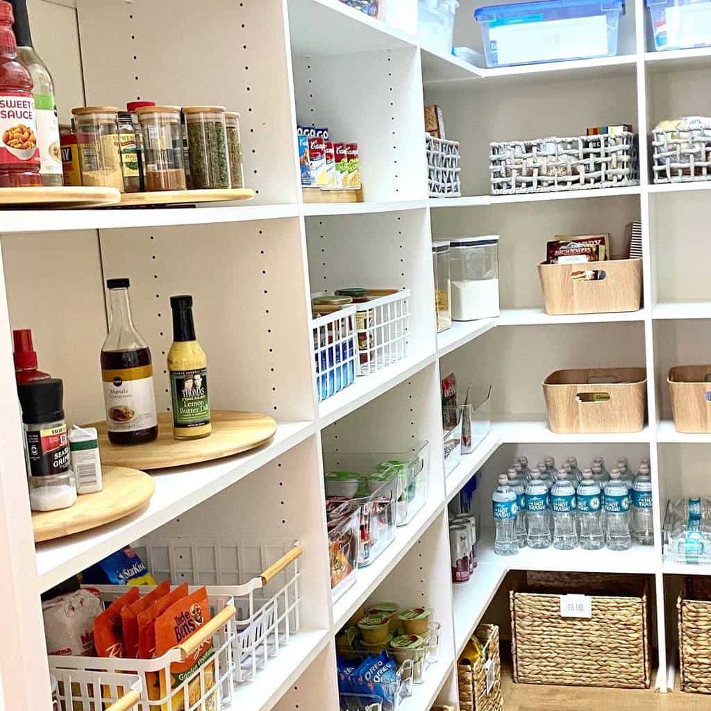 large walk-in kitchen pantry with shelves 