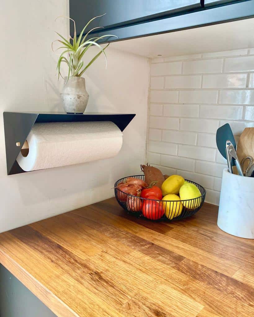 wall paper towel holder kitchen bowl of fruit