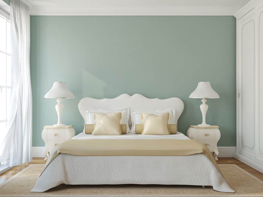 pastel green bedroom white bed