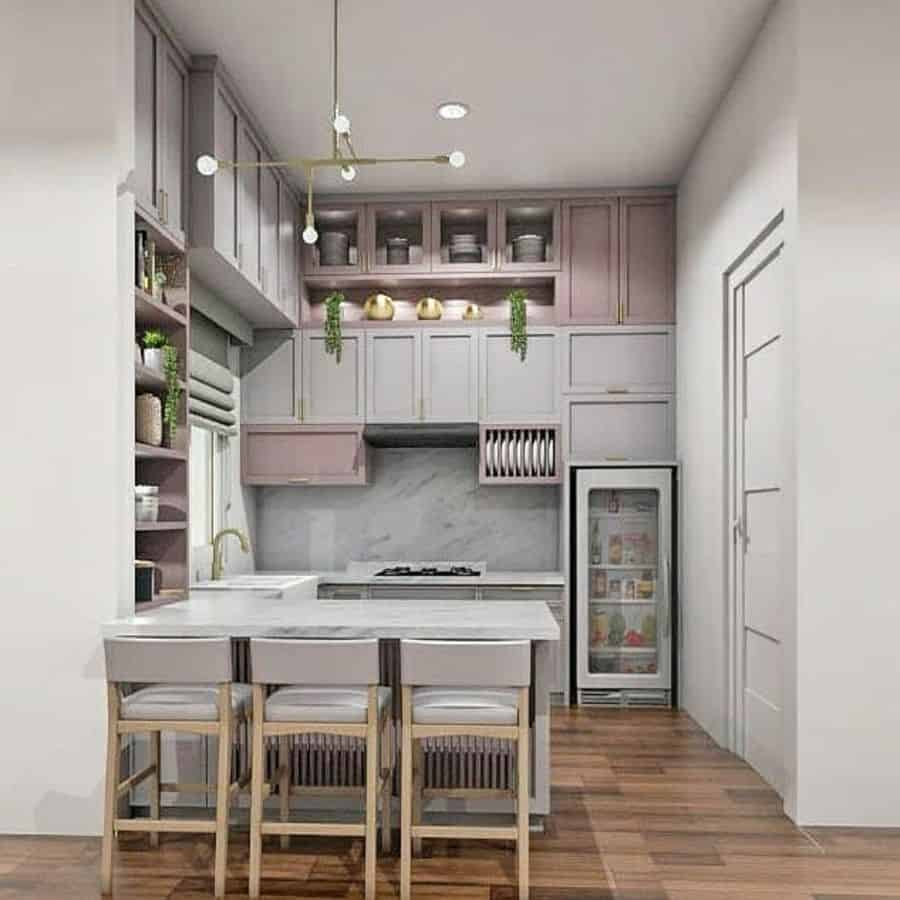 small pink and gray peninsula kitchen bar wood flooring 