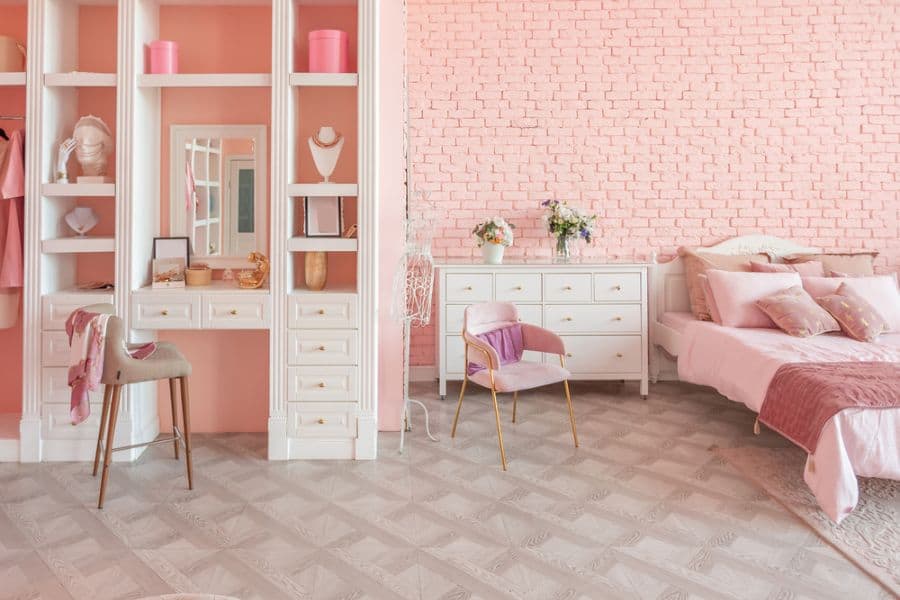 girls' bedroom ideas pink brick wall white cabinets 