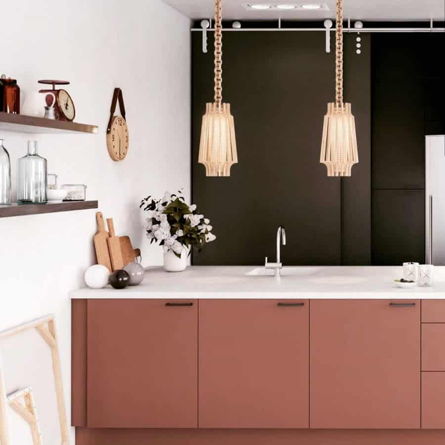 pink cabinets white countertop pendant lights