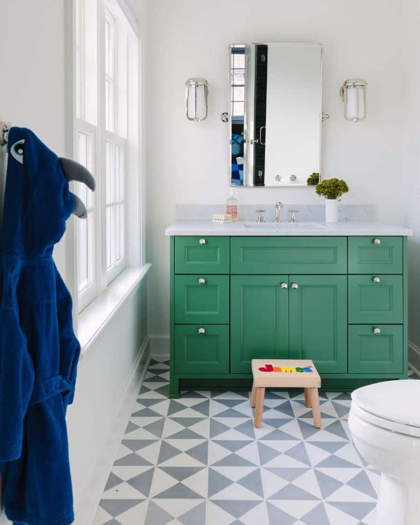 simple kids bathroom green vanity wall mirror tile floor
