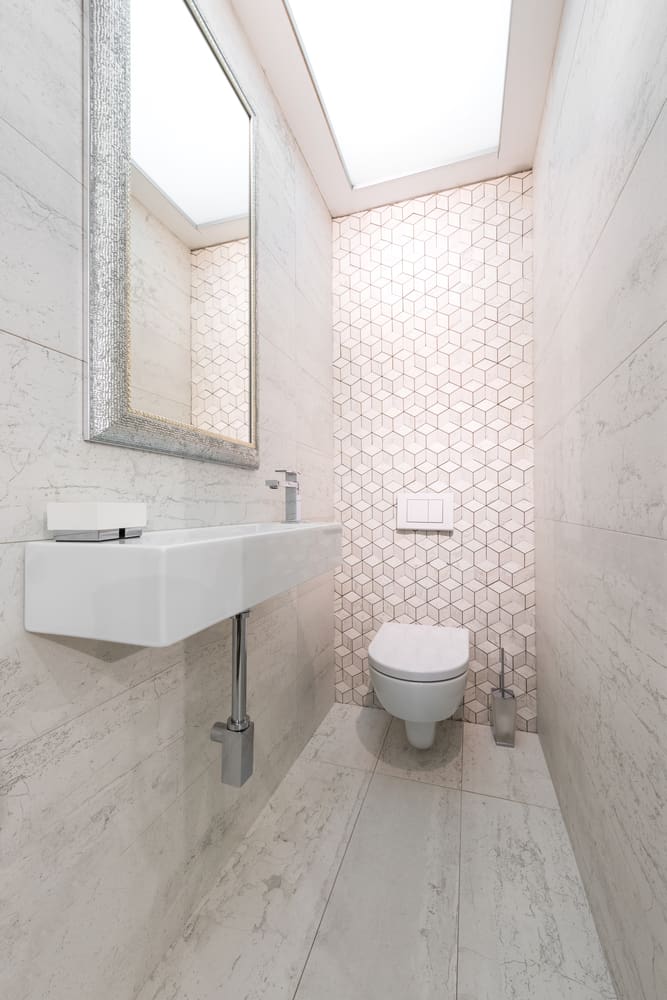 accent wall pattern tiles small powder room
