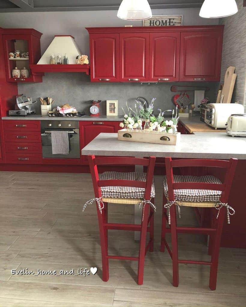 red kitchen cabinets and chairs 