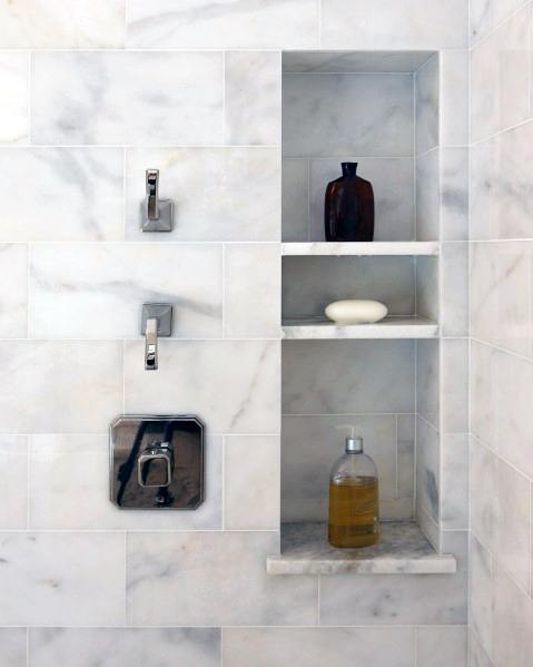 white bathroom with recessed shelf