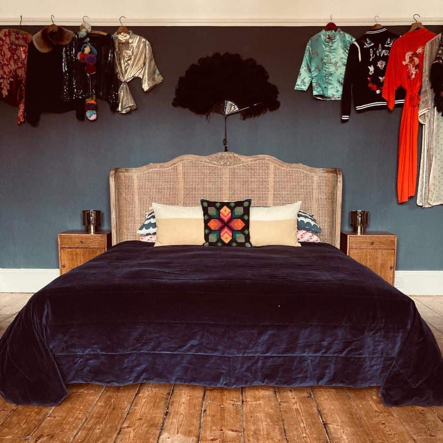retro vintage bedroom with clothes handing from the ceiling 
