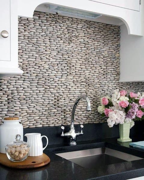 layered pebblestone kitchen backsplash