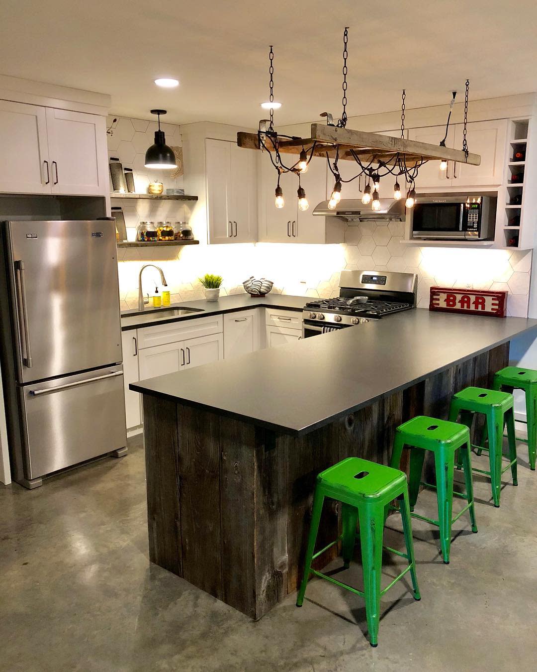 modern kitchen with green stools