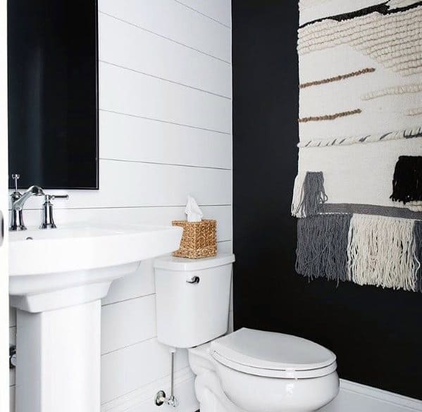black accent wall small powder room 