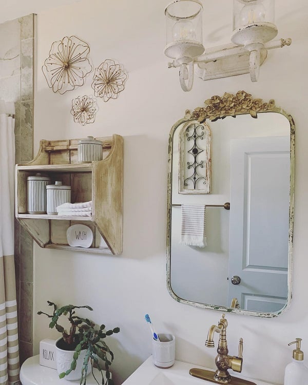 farmhouse small master bathroom with vintage mirror 