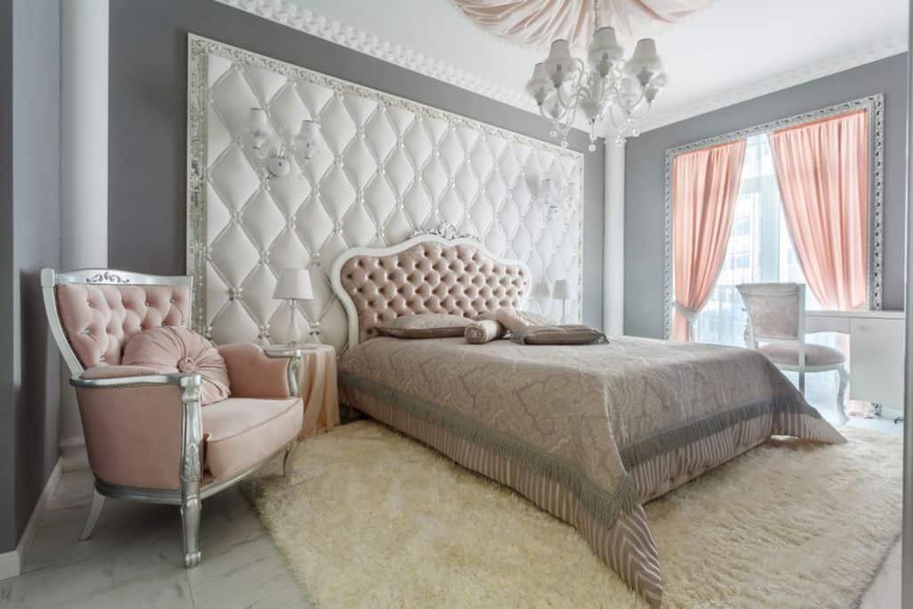 elegant bedroom white floor rug chandelier