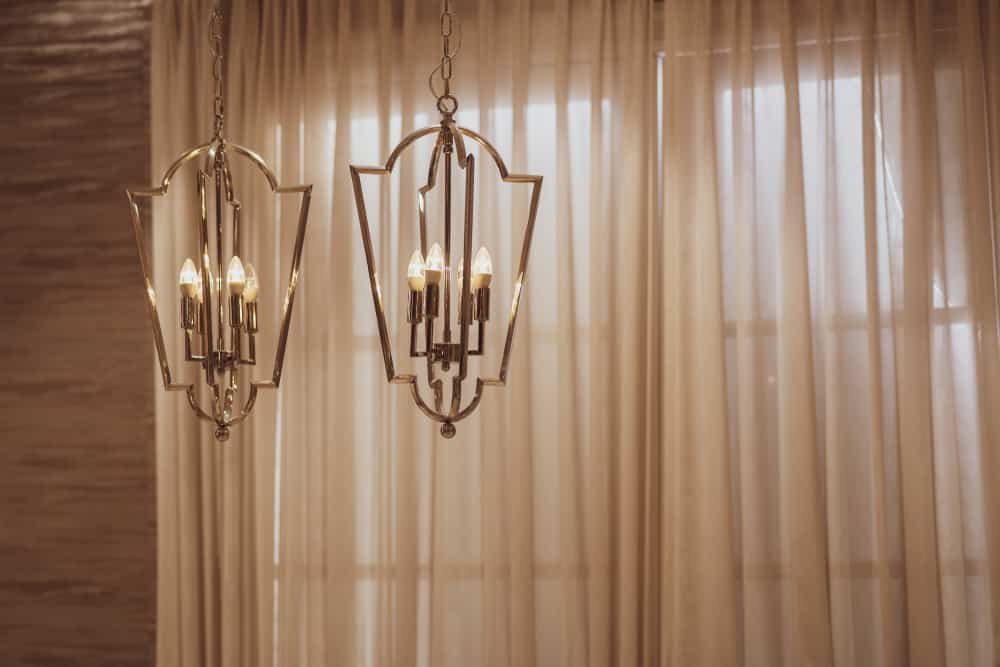 elegant sheer curtains gold ceiling lights 