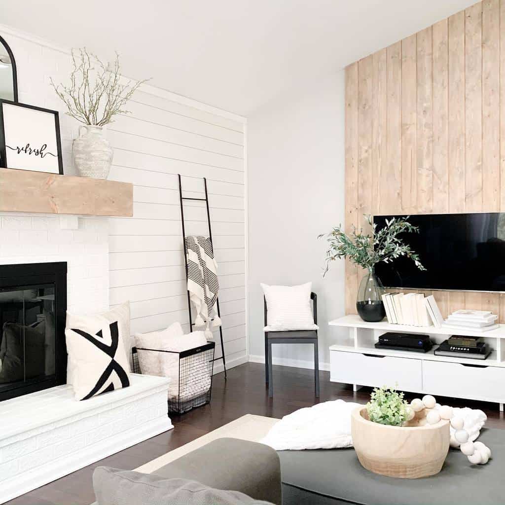 modern living room white shiplap wall fireplace gray sofa wall mounted tv 