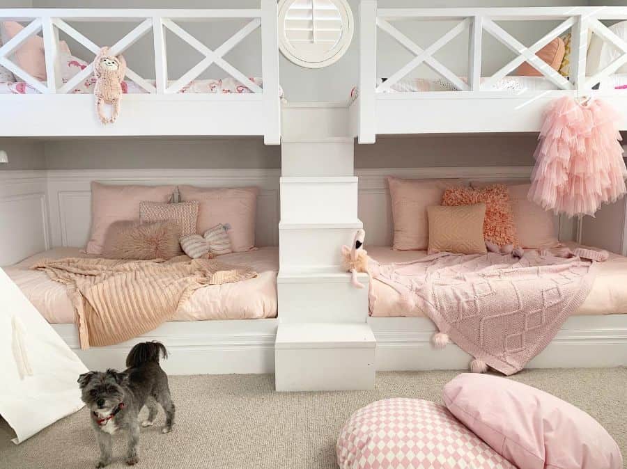 siblings bedroom bunk beds pink bedspread and pillows