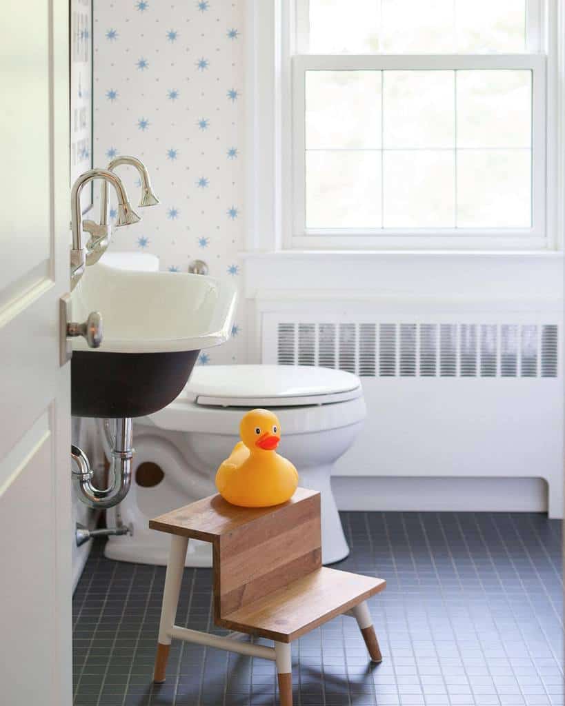 kids bathroom blue star wallpaper rubber duck on steps