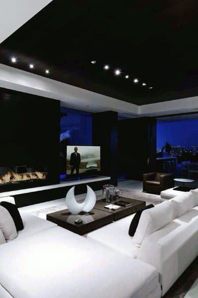modern cinema room electric fireplace big screen tv white sofa 