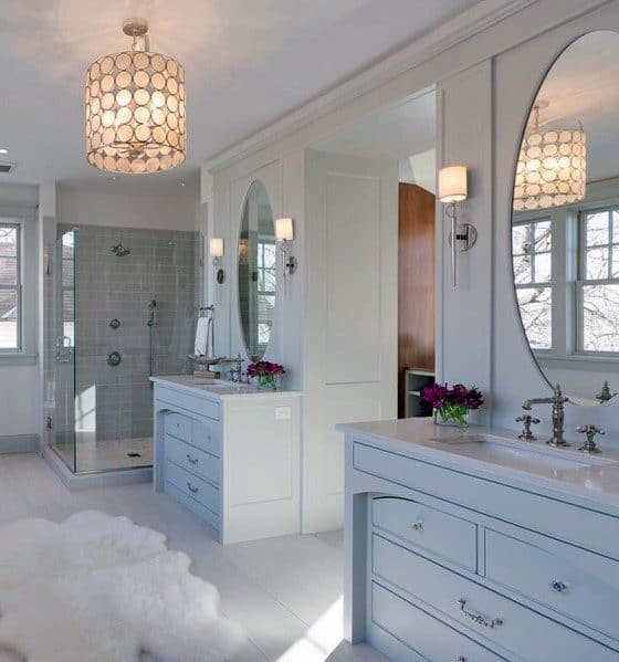 large white master bathroom with dual vanities 