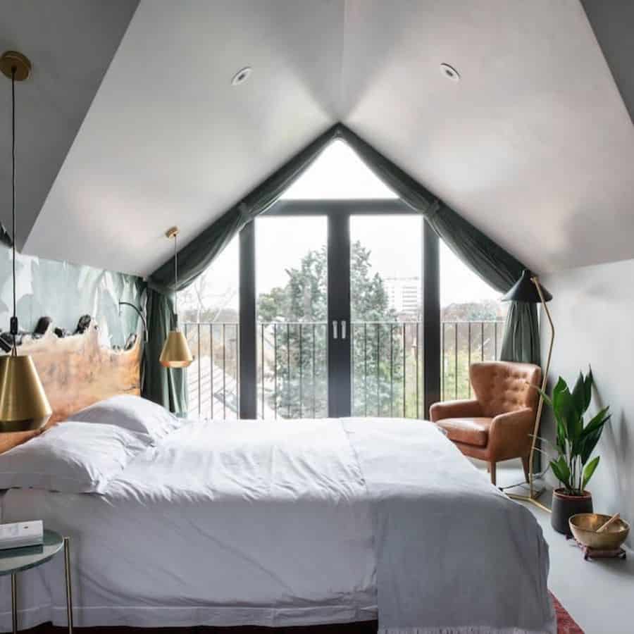 small attic bedroom with city view 