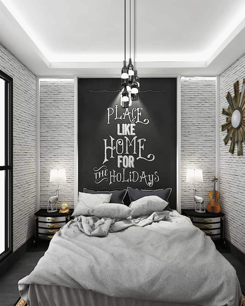 small modern bedroom with chalk board accent wall