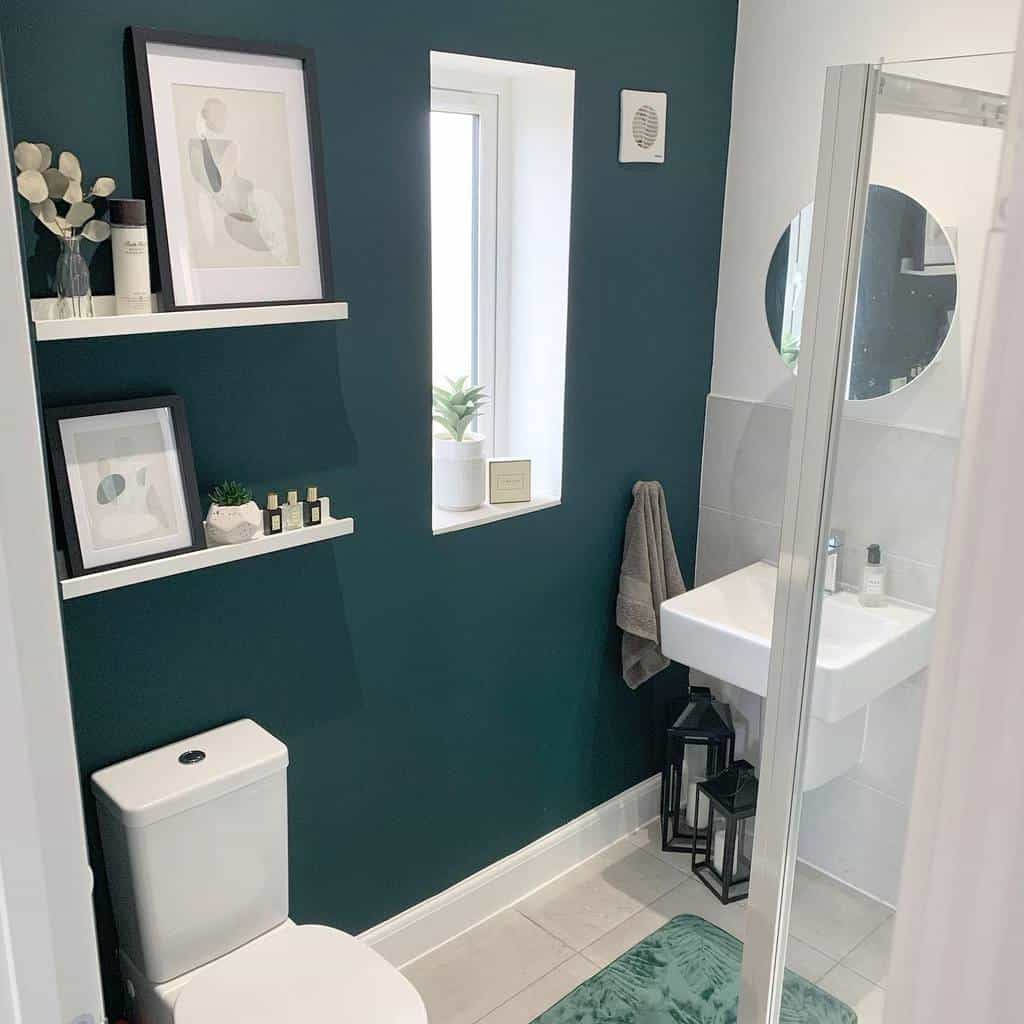 small bathroom with green feature wall