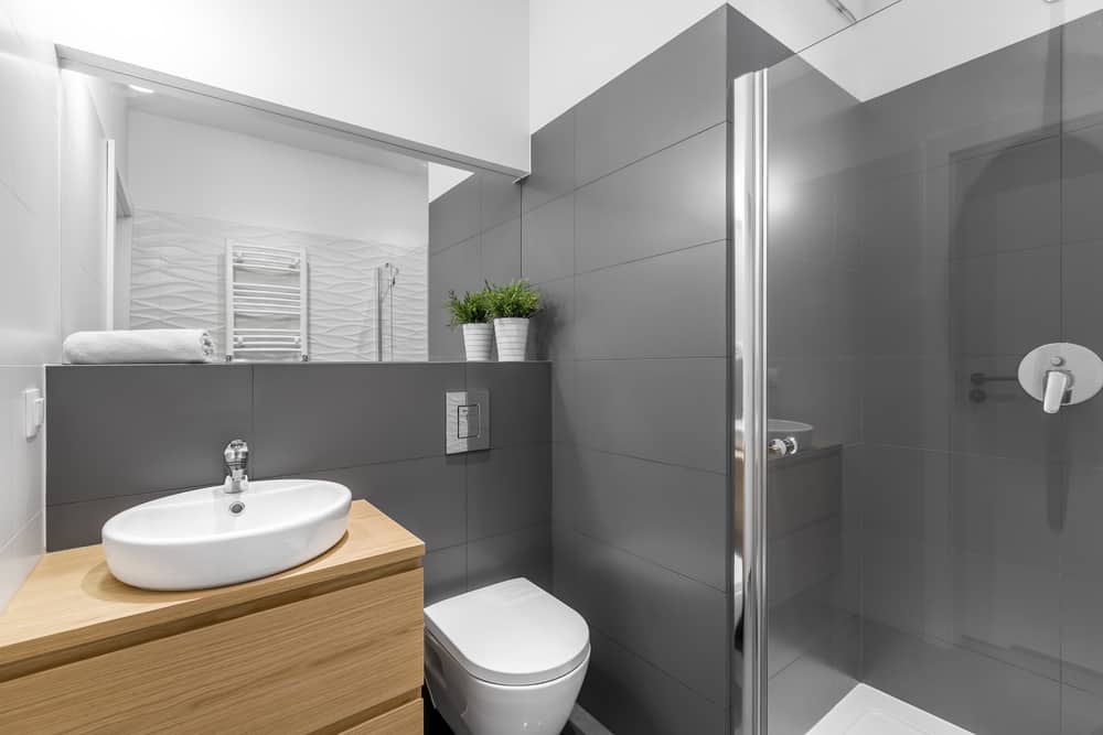 contemporary small gray tile master bathroom 