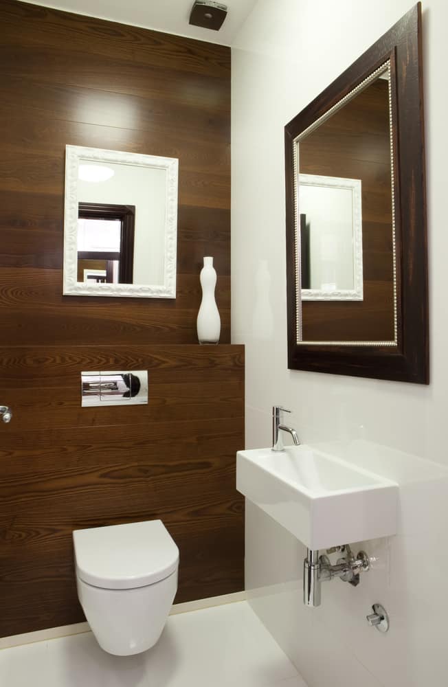 wood panel accent wall small powder room